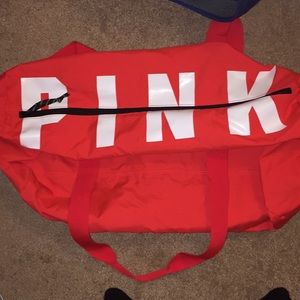 Pink duffle bag